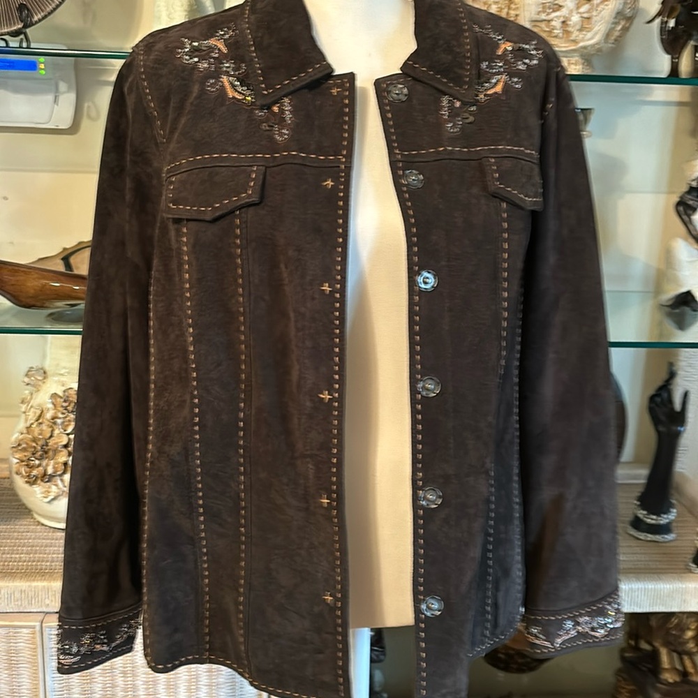 Here is a cold water creek leather jacket with very beautiful beads